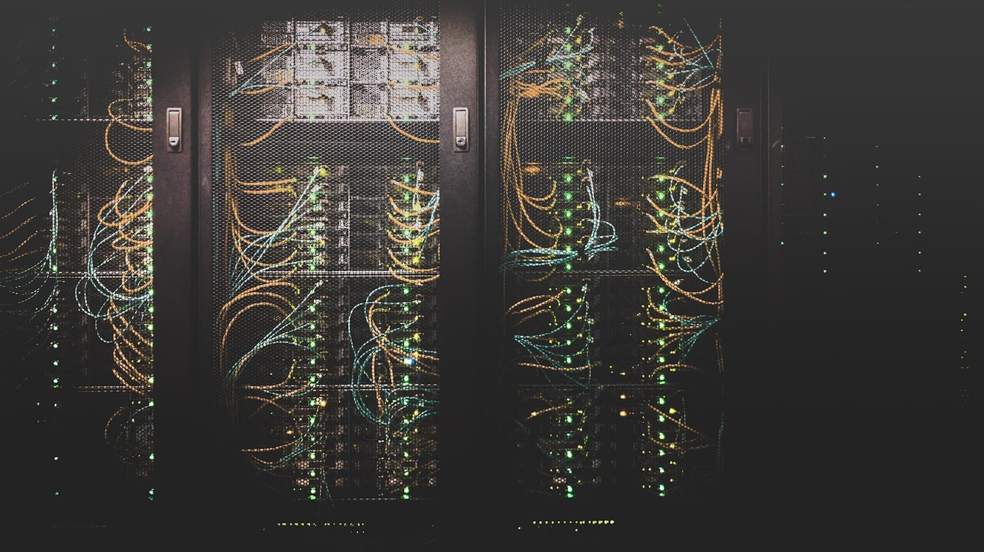Network racks with patched cabling and status lights
